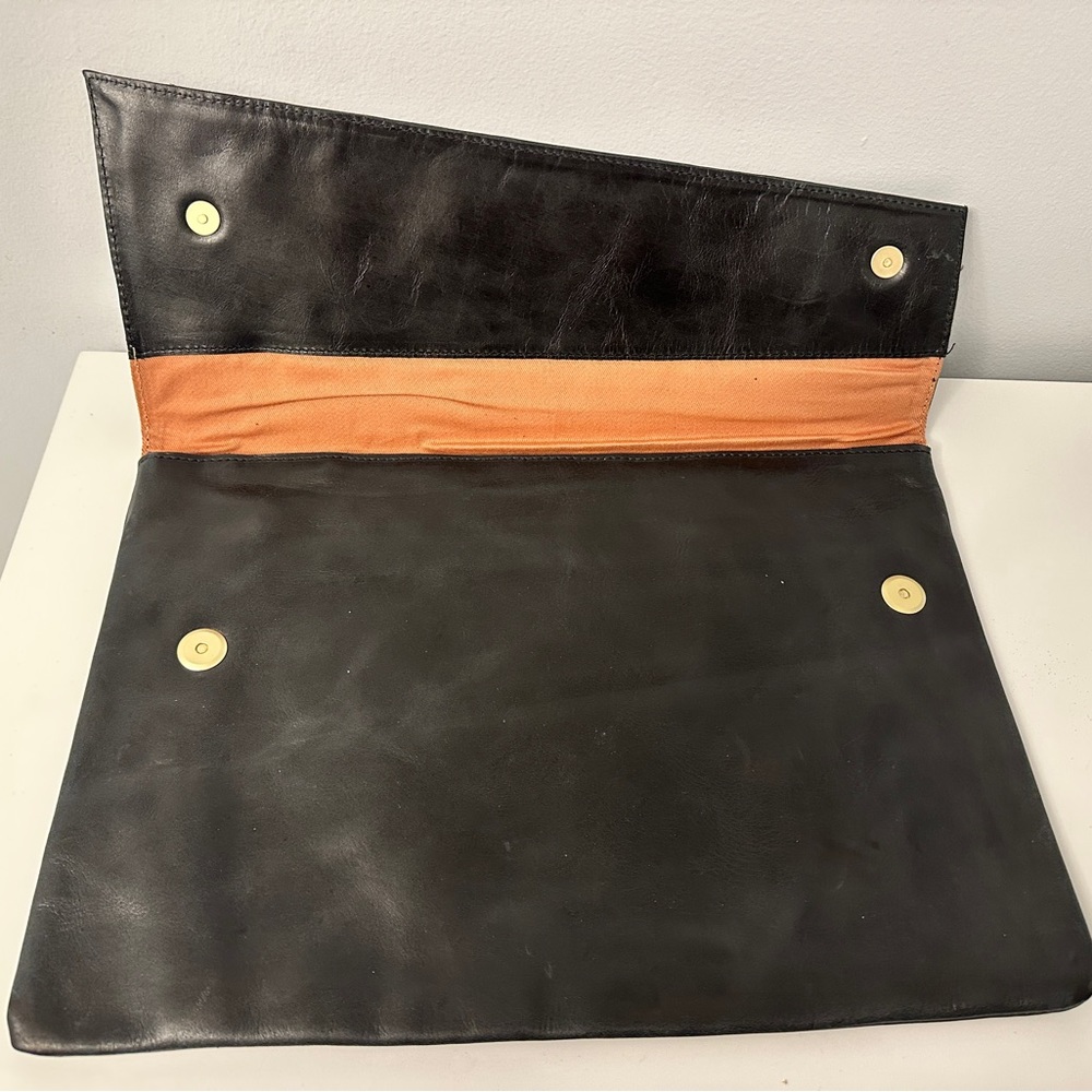 Sseko Oversized Leather Bole Clutch in Oiled Black Leather, ethically handmade